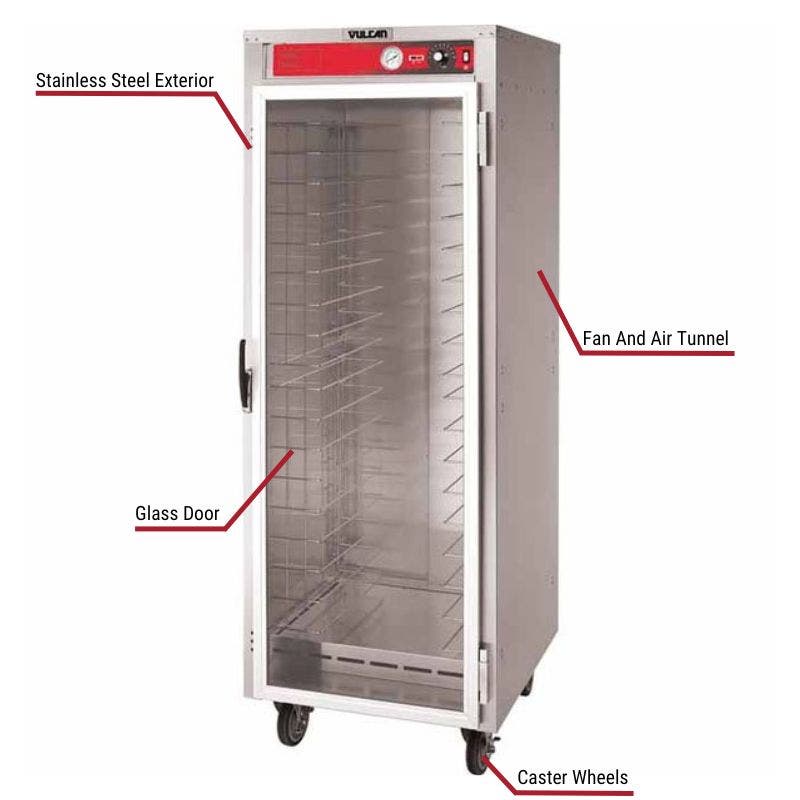 Vulcan commercial warming cabinet with a stainless steel exterior, glass door, fan and air tunnel, and caster wheels. The image includes labeled callouts highlighting these key features.