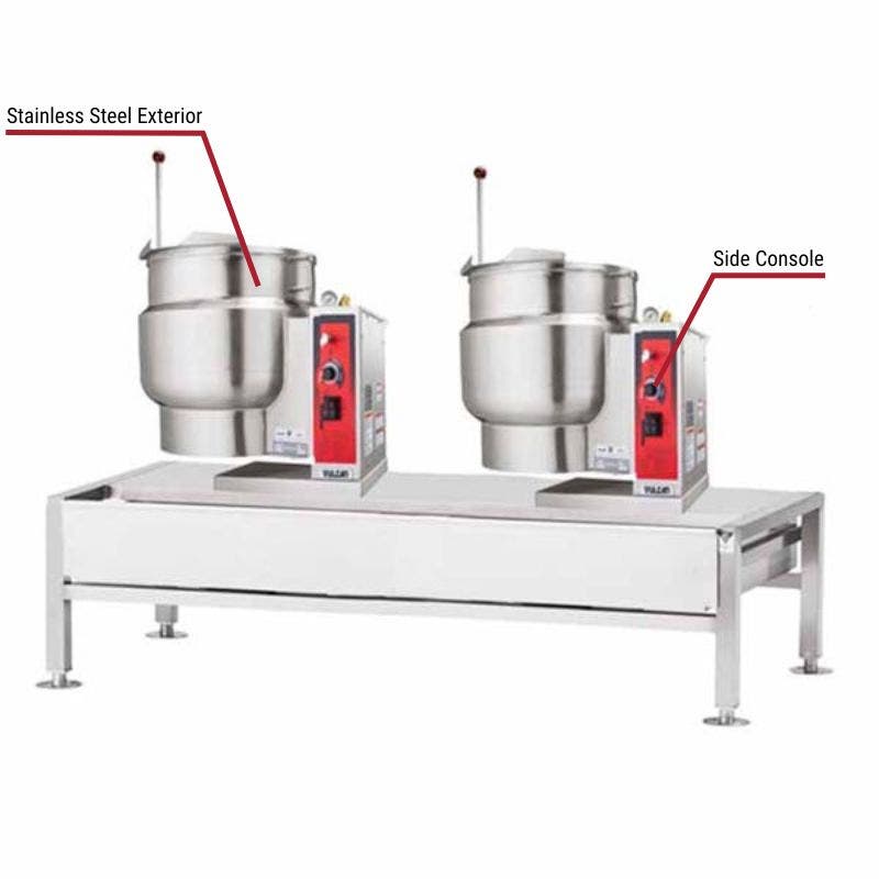 Vulcan commercial dual tilting kettles with a stainless steel exterior and side consoles. The image includes labeled callouts highlighting these key features.