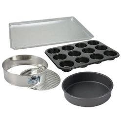 A metal sheet pan, black metal muffin pan, a metal springform pan, and a dark metal cake pan.