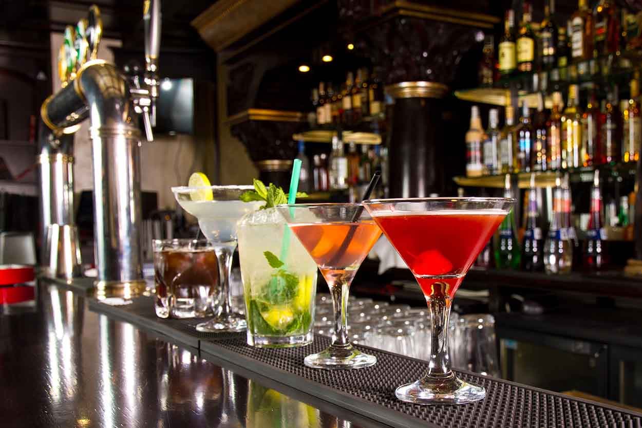 Five cocktails on the bar counter