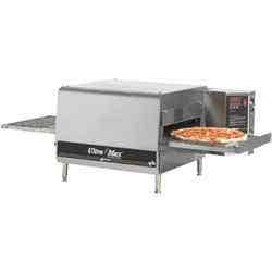 A Star brand conveyor pizza oven with a pizza on it.
