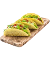 Three hard shell tacos on a wooden serving board.