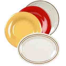 A white and brown speckled platter, a round yellow plate, a round red plate, and a round white and speckled platter.