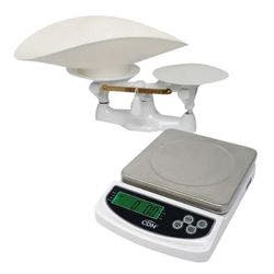 A Penn baker's scale with measuring weights and scoop, and a 22 lb. digital portion control scale.