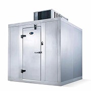 Silver metal walk-in cooler with latched door closed and a condenser on top.