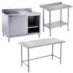 Three stainless steel work tables pictured on a white background. One is and enclosed base work table with the right door slid open, one is a work table with a backsplash and an undershelf, and one is an open base work table.