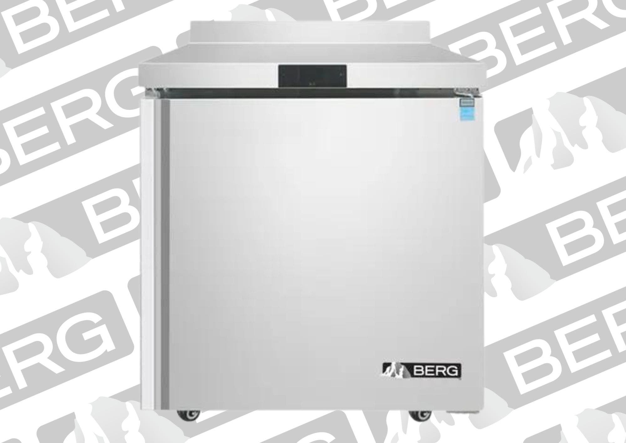 A silver-colored stainless steel Berg worktop freezer with one swinging door.