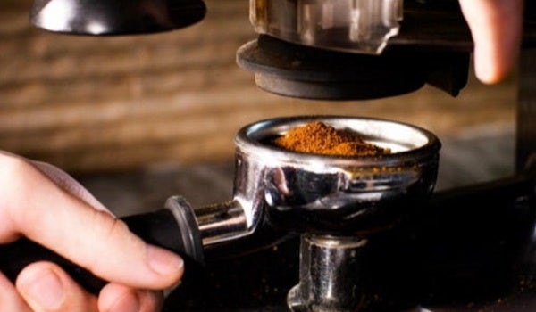 Close-up of commercial coffee maker.