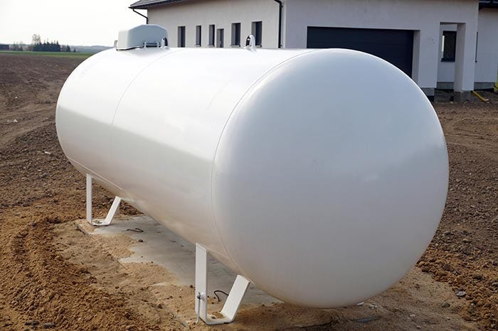 A liquid propane gas tank for heating the house.