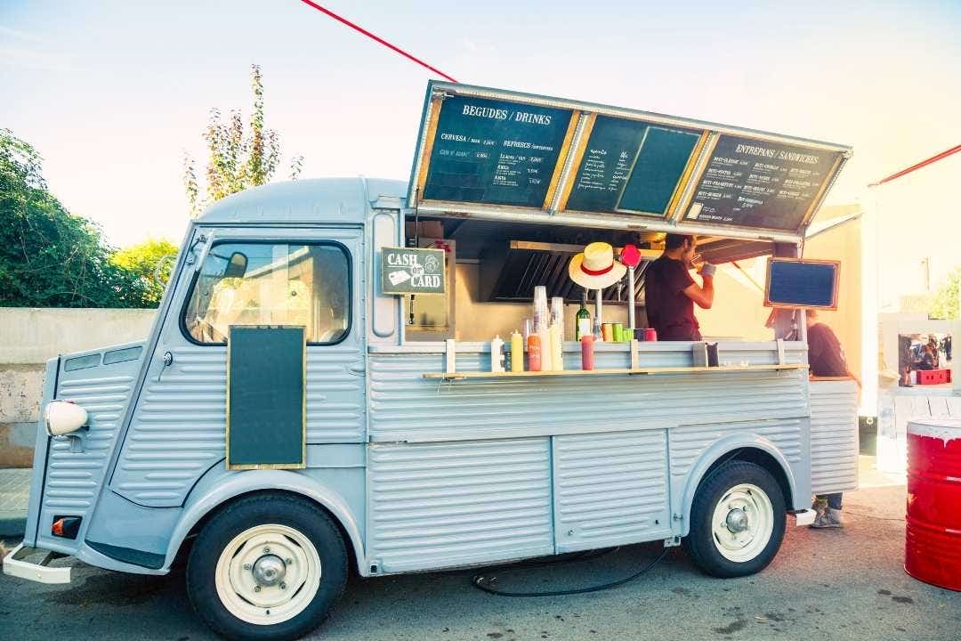 Retro-style food truck serving drinks and sandwiches