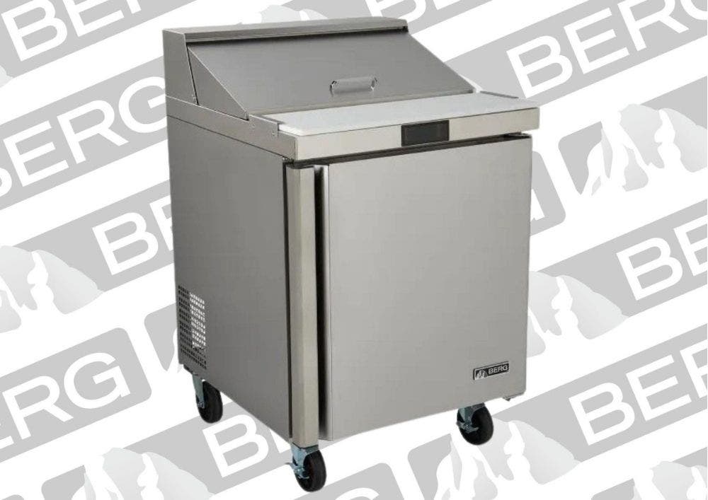 A one door silver colored stainless steel sandwich-style prep table on a background of Berg brand logos.