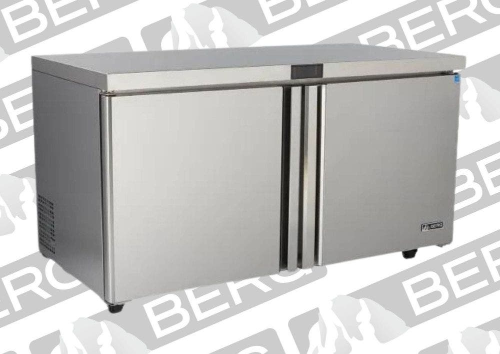 A silver-colored stainless steel Berg undercounter refrigerator with two swinging doors.